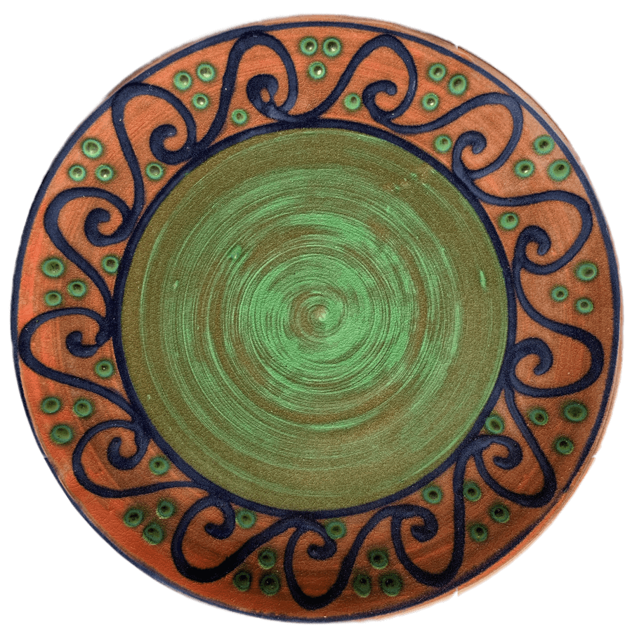 Round pottery pattern with green centre, watermelon outer band with blue waves.