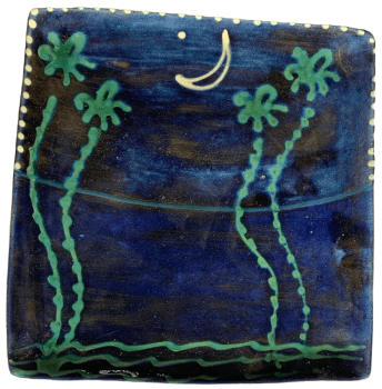 Square pottery design with deep blue background with moon and stars.